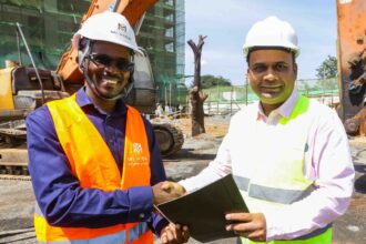Mi Vida Homes Chief Executive Officer Samuel Kariuki (left) shakes hands with Dharmesh Sanghani, Director Parklane Construction after breaking ground at Garden City as part of the real estate efforts to address housing needs in the country.